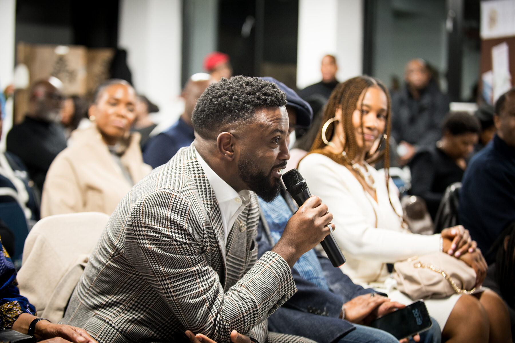 Attendees engaging at a Dominion Mandate event