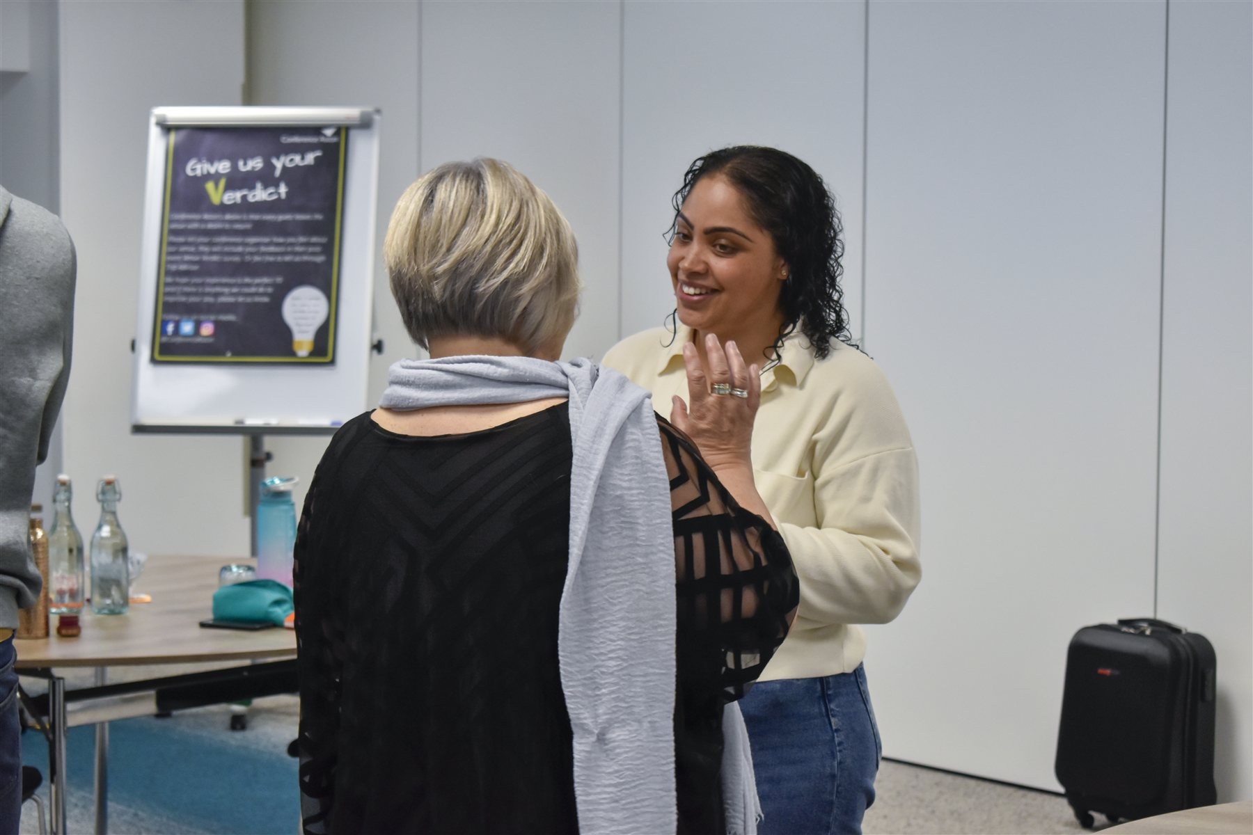One-to-one coaching conversation at a Dominion Mandate session