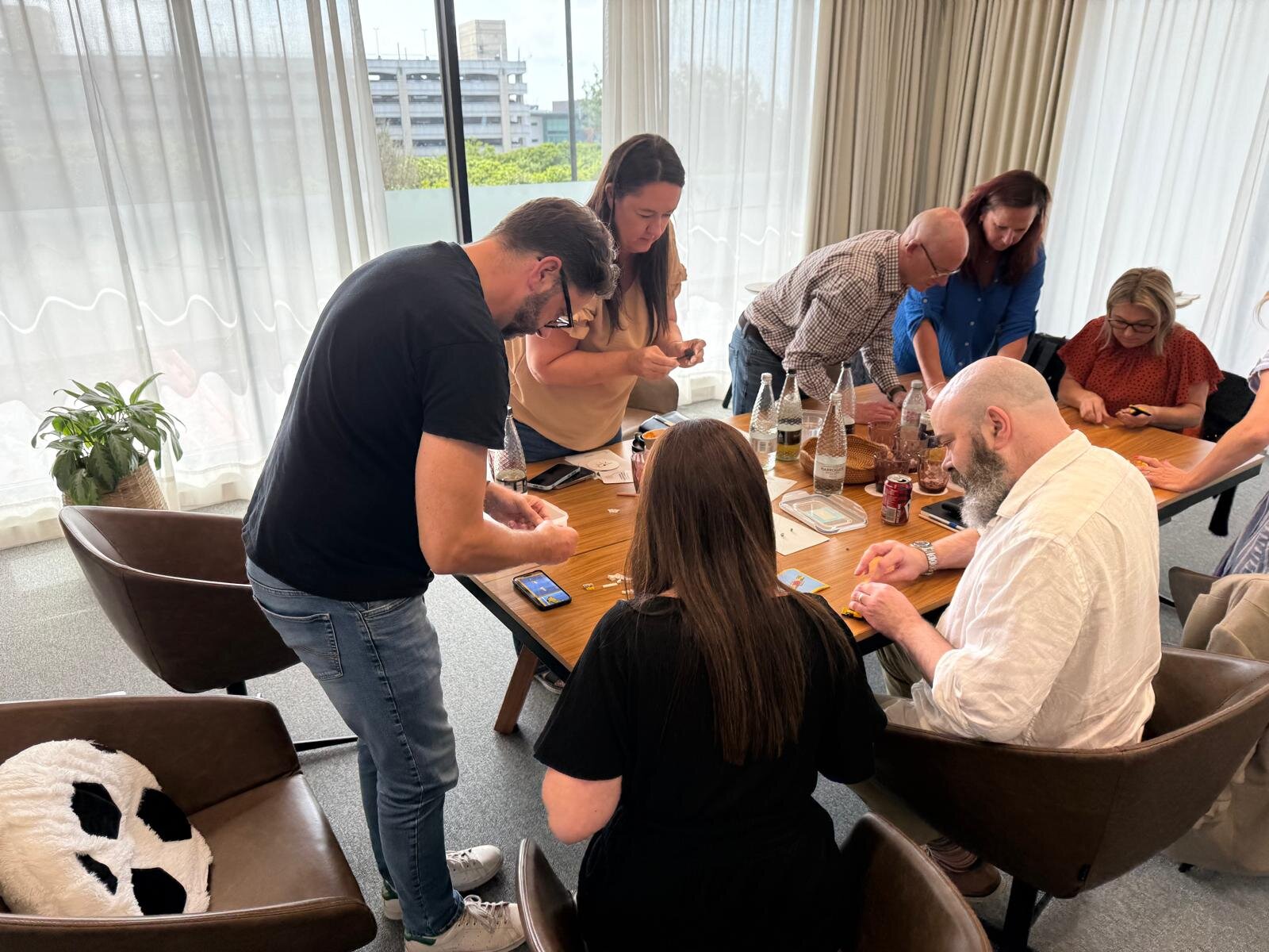 A tribe working together during a business simulation